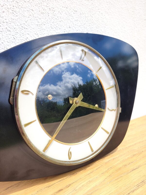 Horloge en formica noir 1960 03